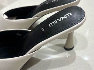 Elegant White Heeled Mules