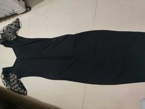 Elegant Black Dress with Sheer Sleeves