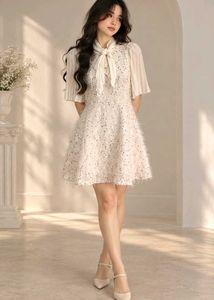 Sparkling White Dress with Bow Detail