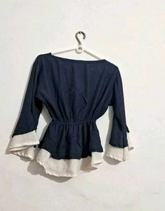 Chic Navy Blue Peplum Top with Bow Detail
