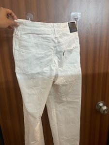Cream Distressed Denim Jeans