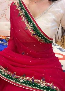 Pink Saree with Embroided Green Border