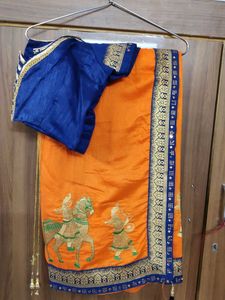 Orange Embroidered Saree with Blue Blouse