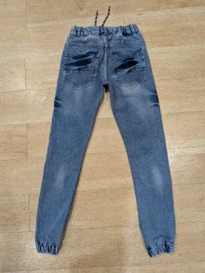 Distressed Denim Jogger Jeans