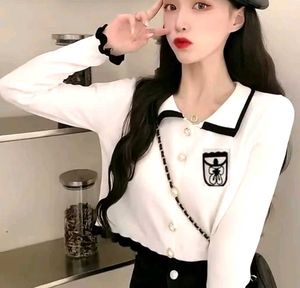 Chic White Cropped Cardigan with Black Trim