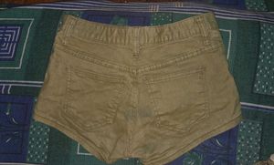 green denim shorts