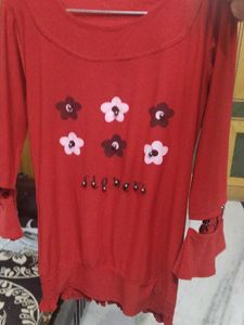 Red top with Floral Embellishments