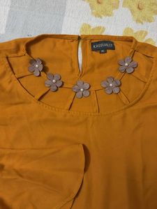 Chic Mustard Yellow Top with Floral Neckline