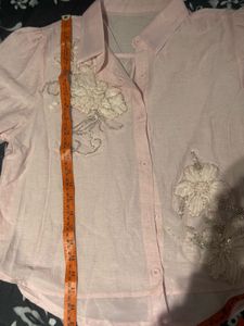 Pink embroidered top