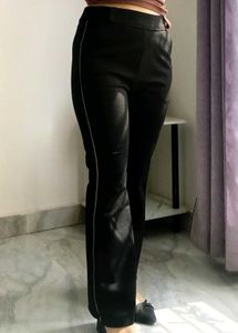 Chic Black Flared Pants with Subtle Stripe Detail