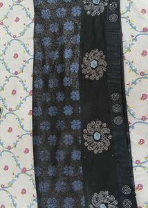 Elegant Black Saree with Blue Floral Print