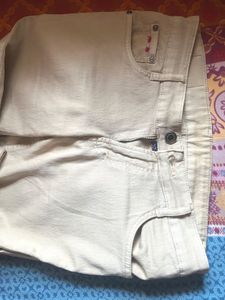 Stylish Beige Jeans with Floral Detail