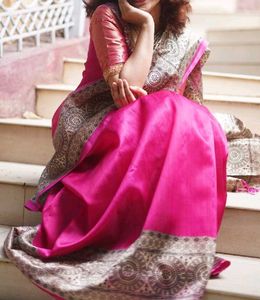 Elegant Pink Saree with Intricate Border