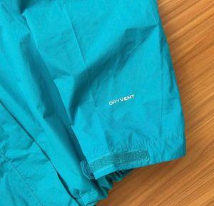 The North Face Teal Rain Jacket