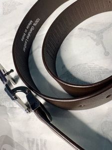 Stylish Brown Belt with Geometric Buckle