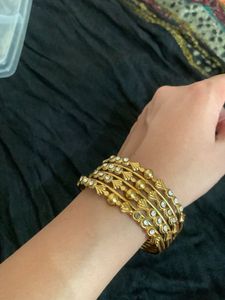 Elegant Gold Tone Bangles with Stones