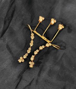 Sparkling Gold-Toned Hand Harness 💎