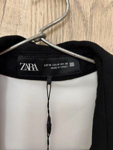 Zara Sleeveless Mini Dress with padded shoulder