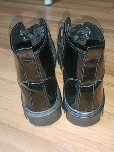 Glossy Black Lace-Up Boots