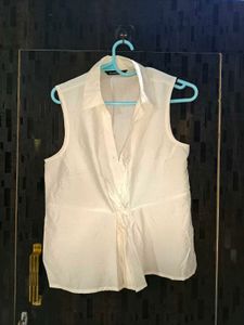 Sleeveless Twist Front Shirt
