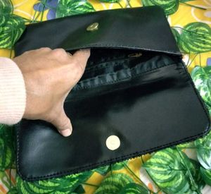 Avon Brand New Clutch
