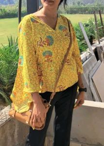 Yellow Printed Peplum top