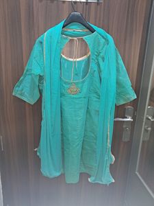 Turquoise teal color suit with Kundan