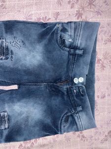 Distressed Flared Jeans