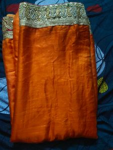 Orange Silk Saree with Gold Border