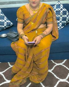 Elegant mustard heavy party wear saree with blouse