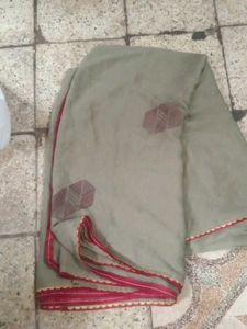 Elegant Grey Saree with Red Border used