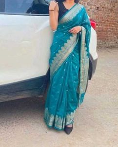 Beautiful Teal Saree with Golden Border