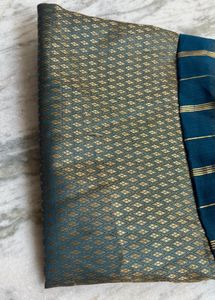 Elegant Teal Saree with Golden Stripes