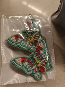 EAR, HAIR AND HAND ACCESSORIES