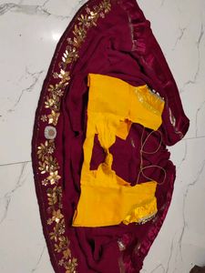 Designer Maroon Saree with Yellow Blouse