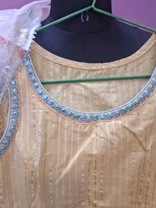 Yellow Striped Kurta Set with Embellished Neckline
