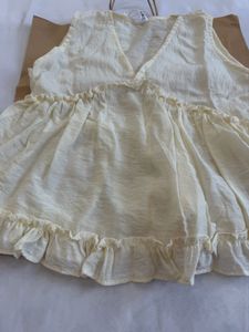 beige cute ruffle top