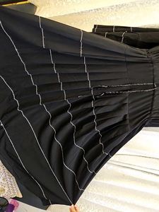 elegant black umbrella abaya with white tiers