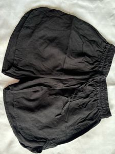Apple cut black shorts