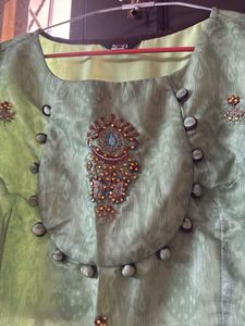 Elegant Green Kurta Set with Intricate Embellishme