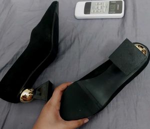 Macy Alfani's First Copy Golden Ball Bottom Heels