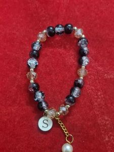 Elegant Beaded Bracelet with Charm
