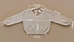 CREAM RIBBED V-NECK SWEATER WITH BACK BOW