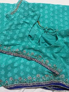 Stunning Teal Saree with Embellished Blouse