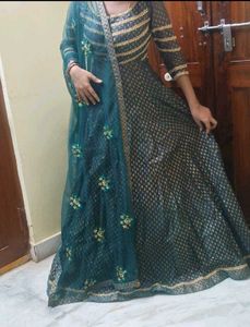 Elegant Teal Kurta Set with Golden Embellishments