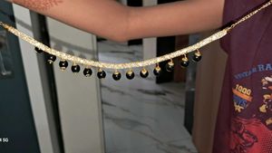 Elegant Black Bead Gold Dangle Earrings and neckla