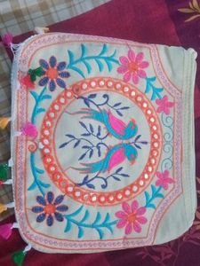 Embroidered Clutch with Tassels