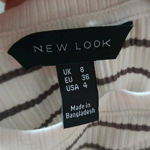 Striped white long-sleeve bodysuit