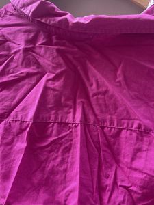 Sleeveless Pink Button-Up Shirt