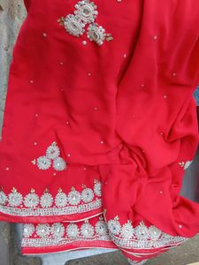 Stunning Reddish Pink Embellished Saree